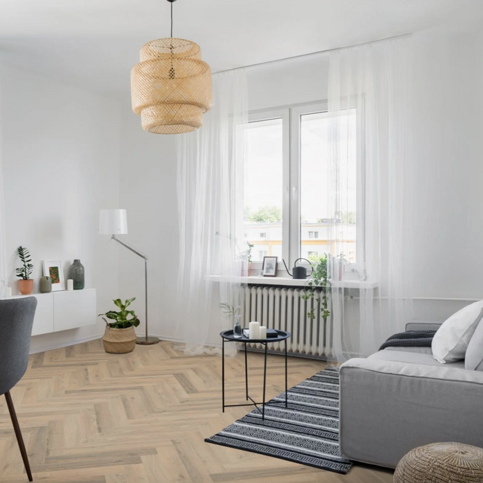 Embrace Elegance: Elevate Your Home with Grey Oyster Herringbone Laminate Flooring