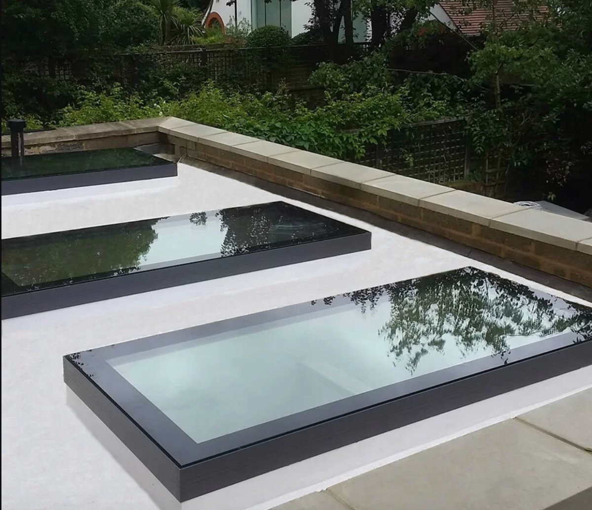 Energy-Efficient Roof Window: Framed Infinity Flat Rooflight - Home Build Doors